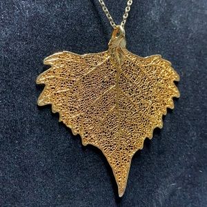 Pretty Vintage gold leaf pendant